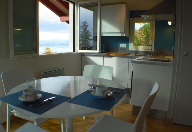 Salle à manger - Location saisonnière  salle à manger, appartement, luxe, location saisonnière, annecy, vacances, vue lac, montagne, chalet, hôtel, neige, soleil