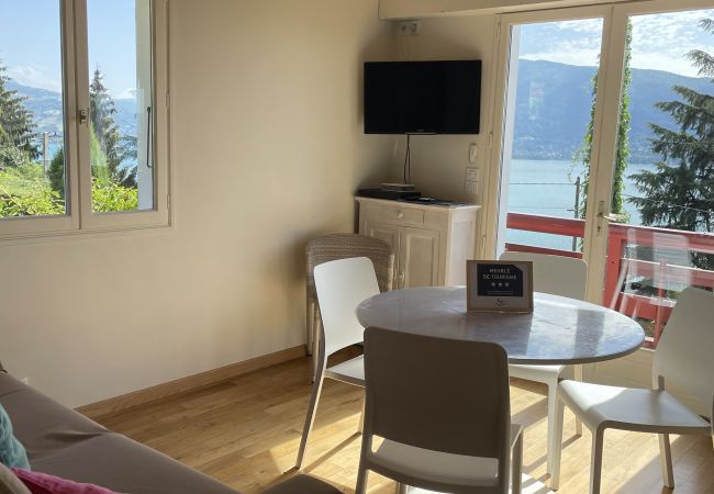 Salon - Location saisonnière  salon, appartement, luxe, location saisonnière, annecy, vacances, vue lac, montagne, chalet, hôtel, neige, soleil