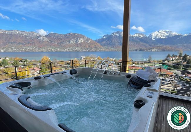 Appartement à louer avec jacuzzi annecy appartement, jacuzzi, vue lac, location saisonnière, conciergerie haut de gamme, vacances, hôtel, annecy, été