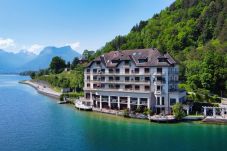 appartement de standing, vue lac, location saisonnière Premium, annecy, conciergerie haut de gamme, vacances, airbnb luxe