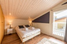 Chambre cocooning avec deux lits simples twinables dans une villa à Bredannaz 