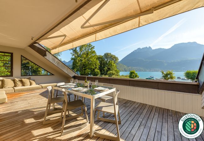 location saisonnière, plage privée, boucle d'amarrage, vue lac et montagnes, vacances, conciergerie de luxe, airbnb